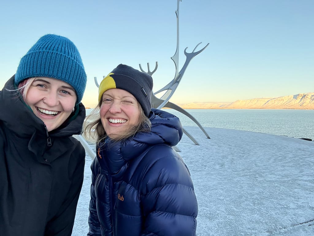 Sun Voyager Two friends in front of Sun Voyager sculpture in Reykjavik
