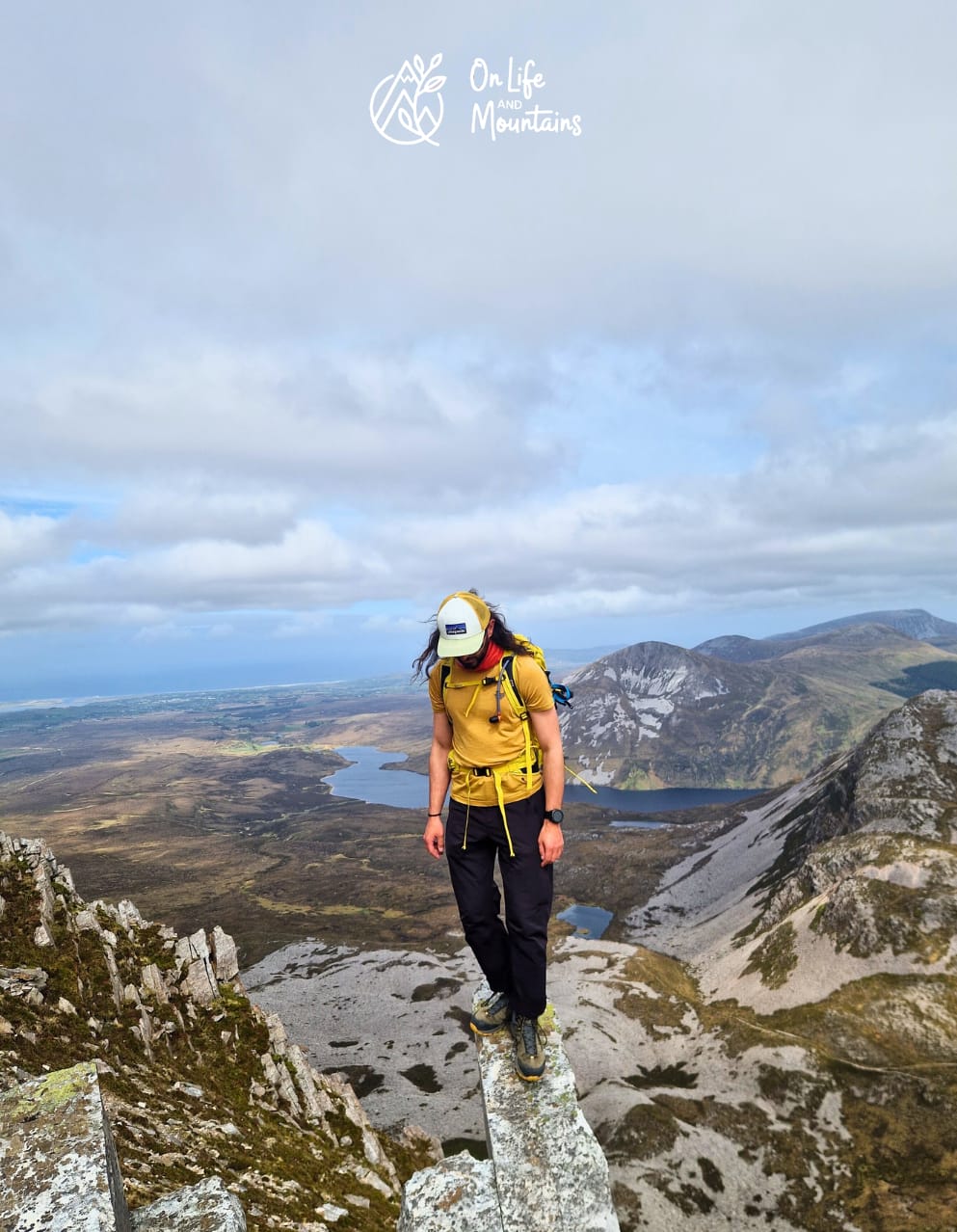 A woman in one of the places to visit in Ireland - Errigal Mountain